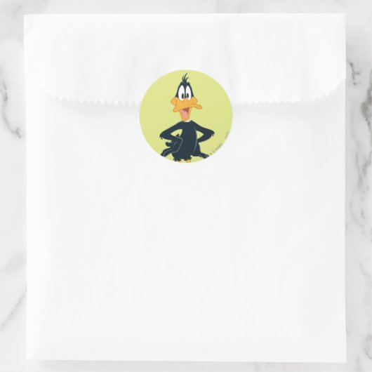 DAFFY DUCK™ RONDE STICKER (Tas)
