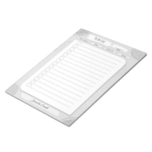 Dagelijkse doelplanner om een lijst met persoonlij notitieblok (Schuin)