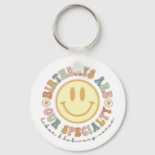 Dagen zijn onze specialiteit, L- en D-verpleeggeld Sleutelhanger (Voorkant)