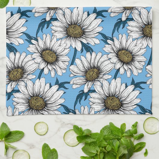 Daisies, wilde bloemen op blauw theedoek (Gevouwen)