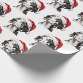 Dalmatiër met kerstmuts cadeaupapier (Hoek)