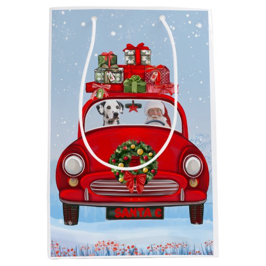 Dalmatische hond in auto met kerstman medium cadeauzakje (Voorkant)