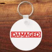 Damage Stamp Sleutelhanger (Achterkant)