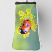 dame bovenop golfheadcover (Draai 90)