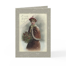  dame in sneeuw met kerstcadeautje