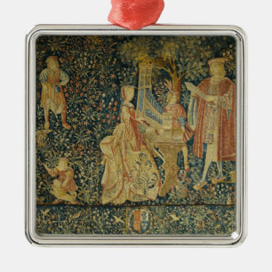 Dame speelt het portatieve orgaan uit metalen ornament