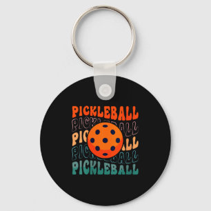 Dames retro pickleball zwaaiende stijl met een aug sleutelhanger