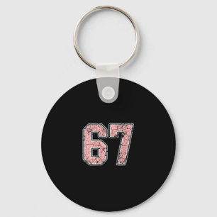 Dames roze en witte nummer 67 jersey speler tenue sleutelhanger