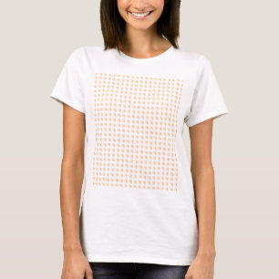 Dames T-shirt met oranje krullen in tegelpatroon