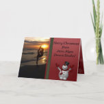 Dancer Silhouette Dance Studio Snowman Kerstmis Feestdagen Kaart<br><div class="desc">Dans of yoga studio-kerstkaart. Ideaal om naar je studenten te sturen tijdens hun kerstvakantie. Aan de voorkant is een foto van een danser in silhouette bij zonsondergang op het strand. Een schattige sneeuwman staat aan de zijkant op een rode kerstachtergrond. Binnenin is een rode achtergrond met dezelfde schattige sneeuwman, en...</div>