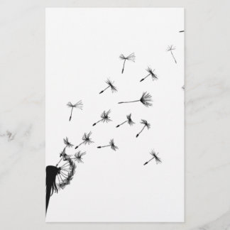 Dandelion puff in de wind