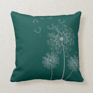 Dandelionbloem op blauwgroen kussen