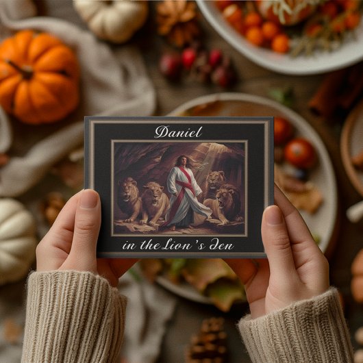 Daniel staande in de leeuwen den zwart briefkaart