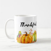 Dankbare oogstpompoenen, bladeren en bladeren koffiemok (Links)