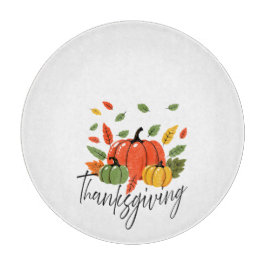 Danksgivingbladeren en pompoen in herfstkleuren snijplank