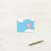 Dans van vliegende varkens op wolkennota post-it® notes (Op bureau)