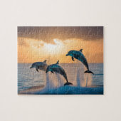Dansen in de schemering: drie dolfijnen springen legpuzzel (Horizontaal)