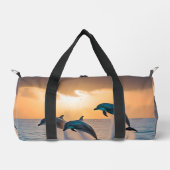 Dansen in de schemering: drie springende dolfijnen plunjezak (Voorkant)