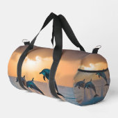 Dansen in de schemering: drie springende dolfijnen plunjezak (Rechterhoek)