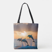 Dansen in de schemering: drie springende dolfijnen tote bag (Achterkant)