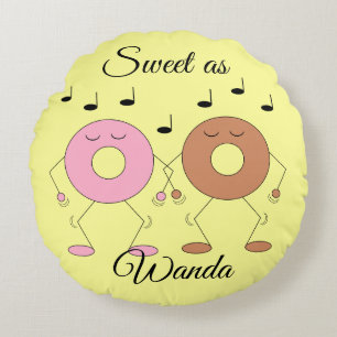 Dansende donuts lichtgeel rond kussen