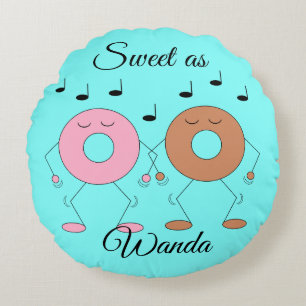 Dansende donuts pastelblauw rond kussen