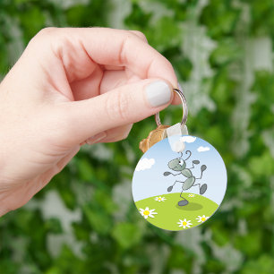 Dansende mier op gras met bloemen sleutelhanger