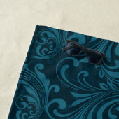 Dark teal floral damask pattern strandlaken (In situ)