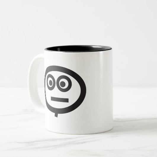 Dazed Face Tweekleurige Koffiemok (Voorkant links)