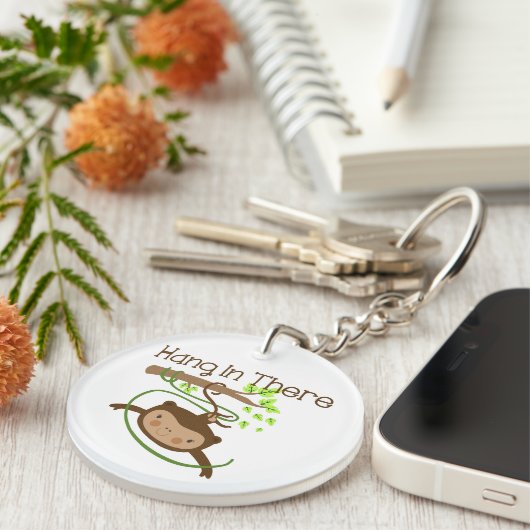 De aap hangt daar in sleutelhanger (Voorkant Rechts)