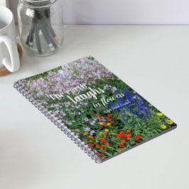 De aarde lacht in bloemen Citaat bloemrijk Notitieboek