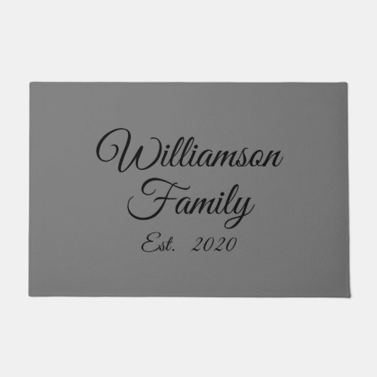 De achternaam, het jaar, het nummer van de koppeli deurmat (Voorkant)