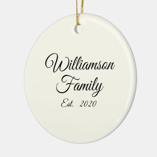 De achternaam, het jaar, het nummer van de koppeli keramisch ornament (Links)