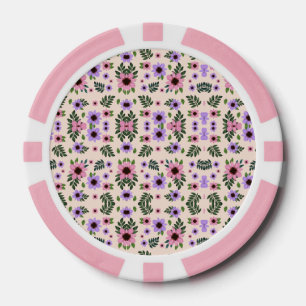 De afbeelding toont pokerfiches met een bloemmotie poker chips