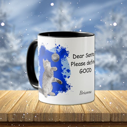 De afspeelbare Kitten heeft de Kerstman nodig om G Mok