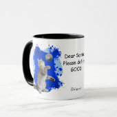 De afspeelbare Kitten heeft de Kerstman nodig om G Mok (Voorkant links)