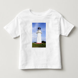 De Araroa, Nieuw-Zeeland. Een vuurtoren geeft Kinder Shirts