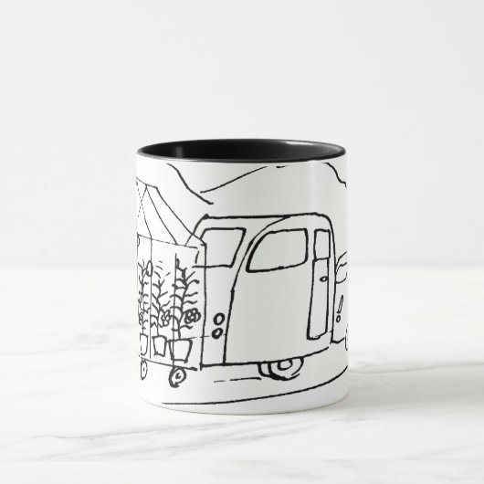 De auto is een Caravan aan het trekken en ook een  Mok (Midden)