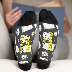 De Baby houdt Sokken van de bemanning schuin