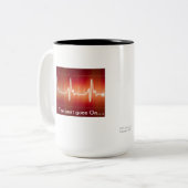 "De Beat gaat door....... Tweekleurige Koffiemok (Voorkant links)