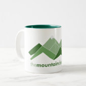 De bergen geven er niets om tweekleurige koffiemok (Voorkant links)