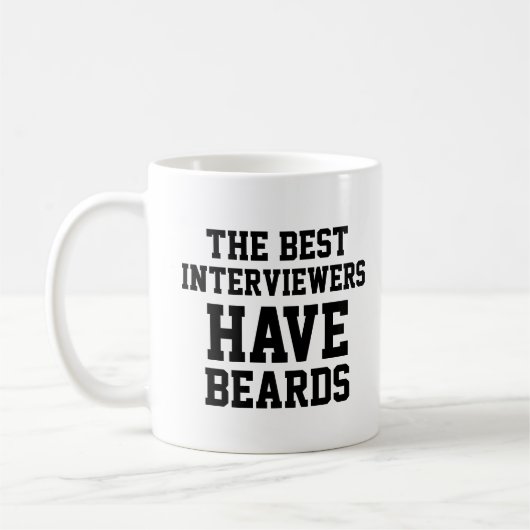 De beste interviewers hebben oormerken koffiemok (Links)