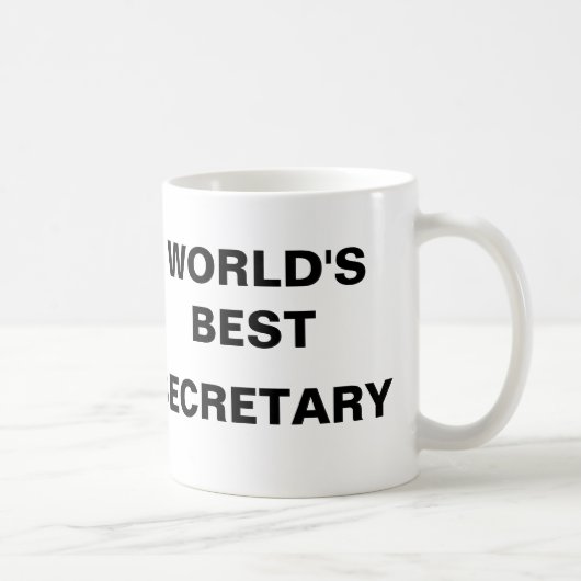 DE BESTE SECRETARIS VAN DE WERELD KOFFIEMOK (Rechts)