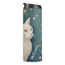 De betoverende witte kat met groene ogen