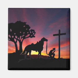 De biddende cowboy aan de voet van de kruismagneet magneet