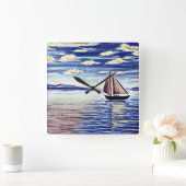 De boot beweegt weg van de kust vierkante klok (Huis)