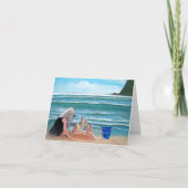 De bouwzandkasteel van het meisje bij de kaarten (Voorkant)