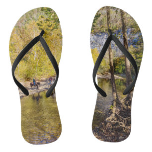 De buffelrivier overschrijden teenslippers