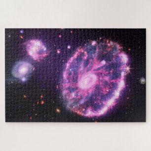 De cartwheel-as Hubble & JWST Legpuzzel