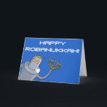 De Chanoeka van de robot! Feestdagen Kaart<br><div class="desc">Deze kaart is voor uw Joodse vrienden. Of robotvrienden. Of Joodse robotvrienden. Het schildert een robot vast:bouten- met yarmulke en een menorah voor een hand af. De achtergrond is helder blauw, met de woorden "Gelukkige Robanukkah!" in witte brieven - hoewel u die titel totaal schrappen of kunt veranderen als u...</div>